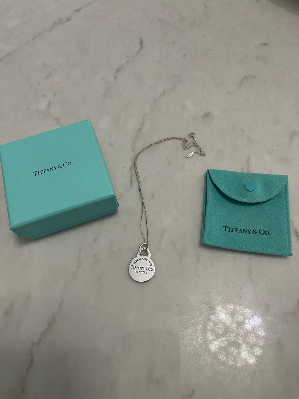 Tiffany & Co silver charm with chain box and pouch